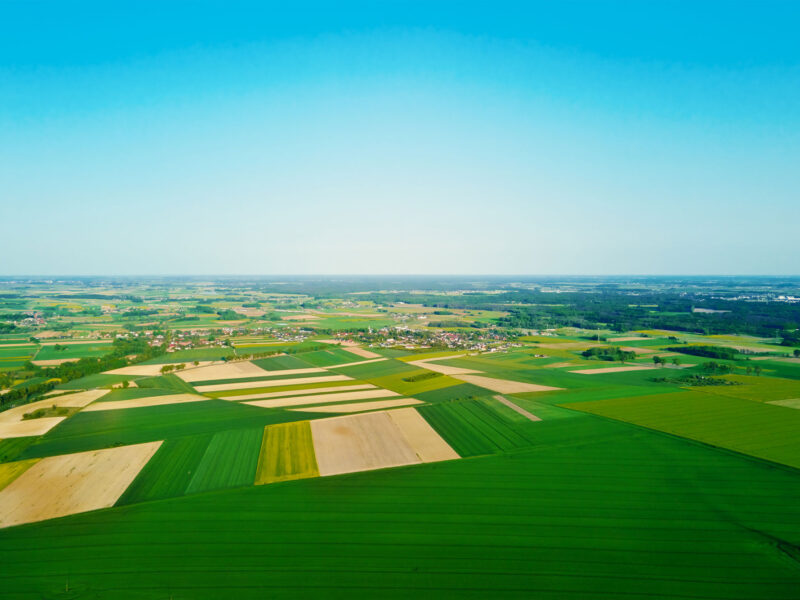 aerial view of countryside with agricultural field